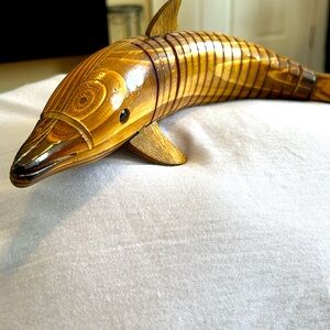 Handmade dolphin made with Guayacan wood. Movable. 13 in